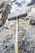 Rome Double Pie Iron 1605 Cast Iron Rectangular Cooking Head Resting in Campfire Ash - Lifestyle Shot | United RV Parts