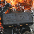 Rome Double Solid Cast Iron Pie Iron 1605 Closed on Burning Campfire Logs - Top Detail View | United RV Parts