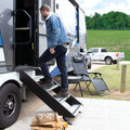 Man Using Black MorRyde RV Entry Steps on Motorhome - Real World Application | United RV Parts