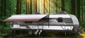 Burgundy Fade Universal RV Awning Replacement Fabric Fully Extended on Travel Trailer - Side Lifestyle View | United RV Parts