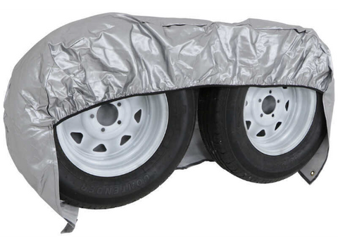 ADCO Double Axle Tire Cover Fitted Over Two RV Wheels - Angled Front View | United RV Parts