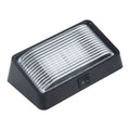 Black RV Porch Light with Switch and Clear Ribbed Lens - Angled View | United RV Parts