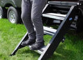 Black Steel MORryde 30 Inch 3-Step Fold Up RV Step - Side View | United RV Parts